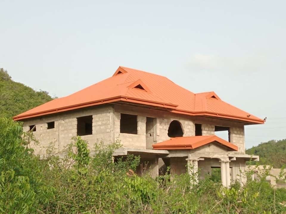 Completed orange metal roof home